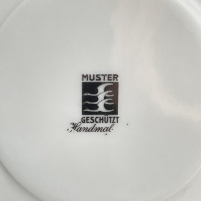 Muster Geschultzt клеймо бренд